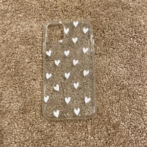 clear iphone 11 case with white hearts.